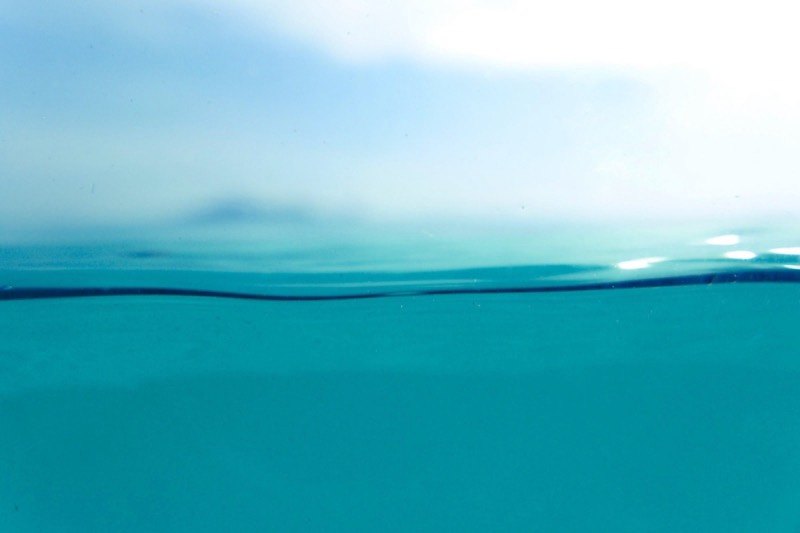 A water line against a pale sky